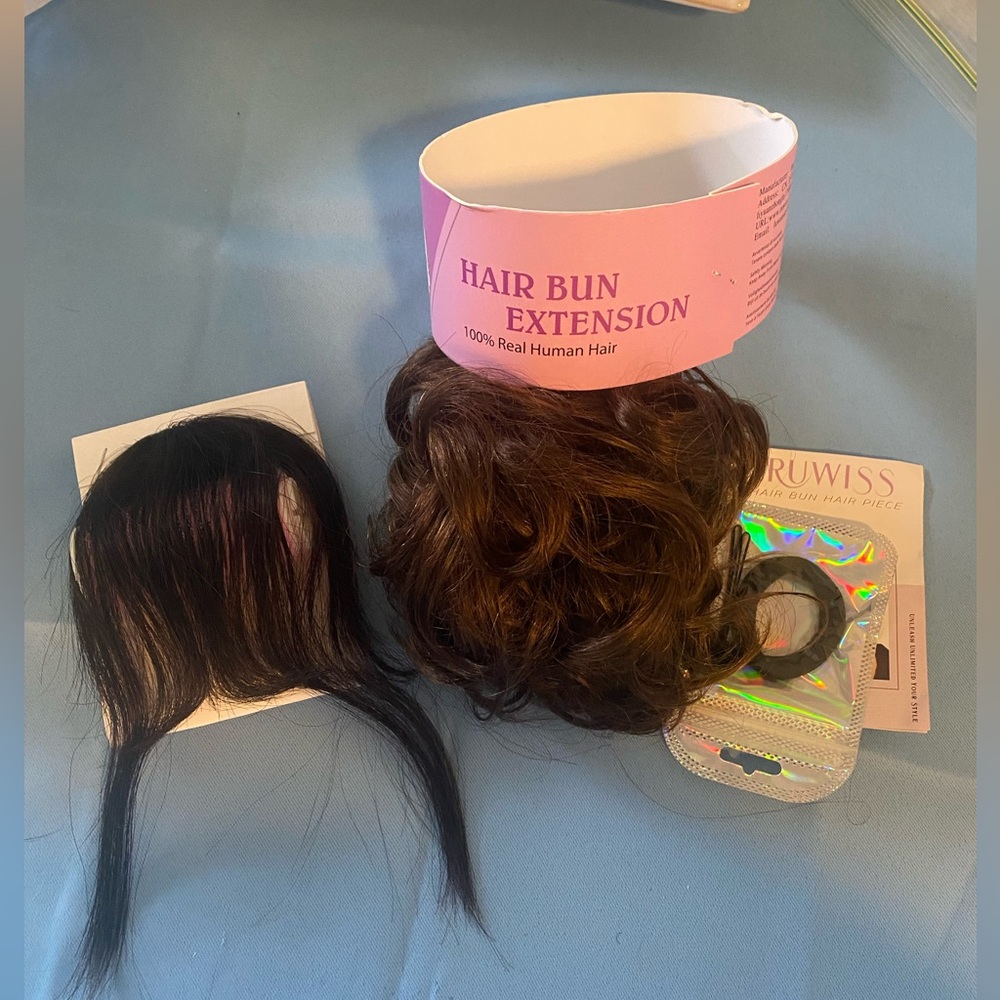Set of two human hair add on hair pieces.